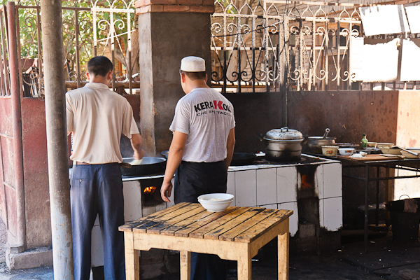 Cook's helpers at an outdoor eatery near Yanghai (Shanshan, Xinjiang)