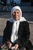 081021-5709 Elderly woman begging on the street in Turfan, Xinjiang