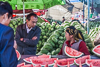 081021-5732 Chatting over the sale of watermelons in Turfan, Xinjiang