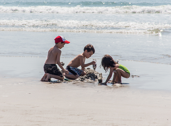 Children playing in the sand, Jetty Park beach