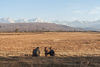 071103-2991 Kyrgyz men and children relaxing in the sun