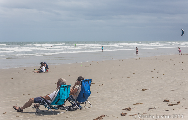 People relaxing on Cape Canaveral beach