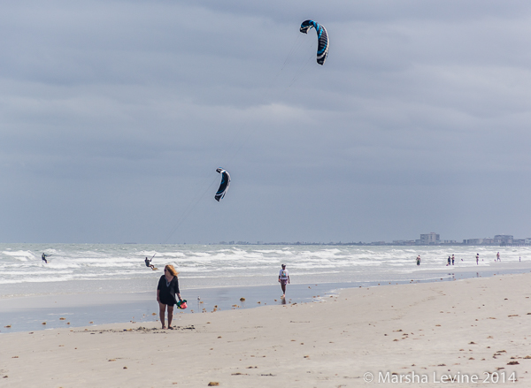 Walkers and kitesurfers on Jetty Park beach, Cape Canaveral 