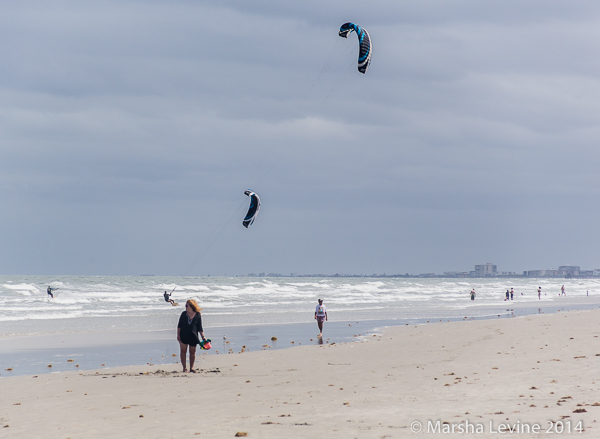 Walkers and kitesurfers on Jetty Park beach, Cape Canaveral