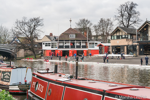 Rowers outside Lady Margaret and Queens' College boathouses