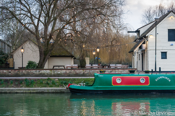 Narrowboat moored alongside the Fort St George pub, Cambridge