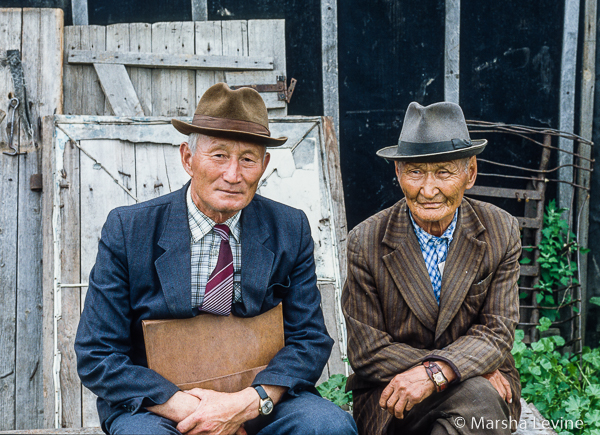 Portrait of two elderly gentlemen at Botai Aul, Kazakhstan